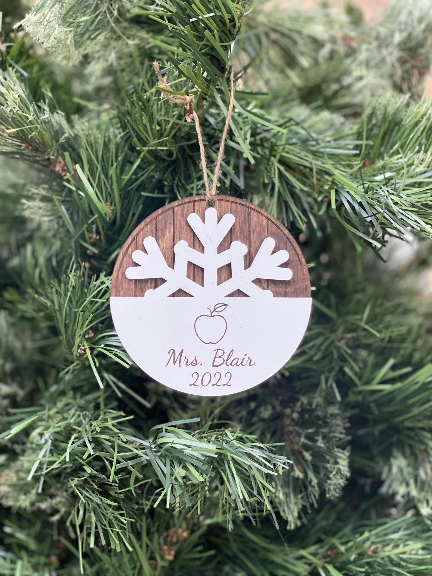 Personalized Teacher Apple Christmas Ornament. Wood engraved snowflake with custom name and year gift for teachers. Okie Original