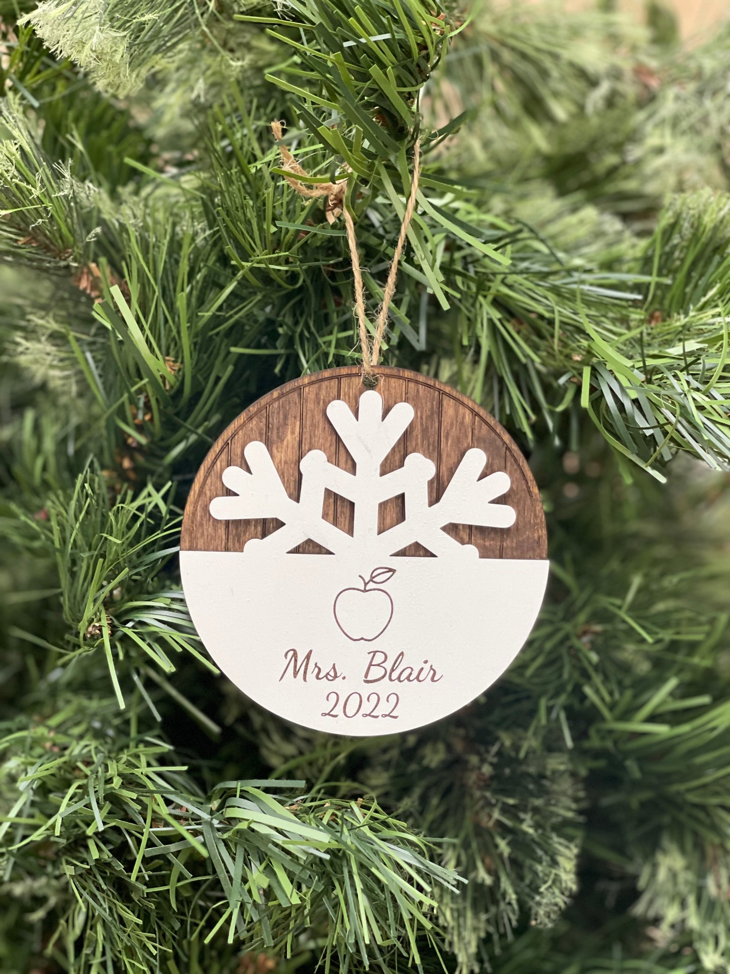 Personalized Teacher Apple Christmas Ornament. Wood engraved snowflake with custom name and year gift for teachers. Okie Original